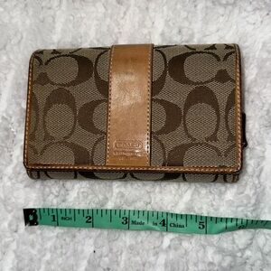 Coach signature tan and brown large bifold orange and leather interior
